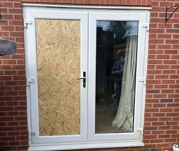 House burgled with patio door boarded up