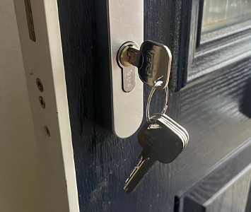 Replacement lock on a composite door