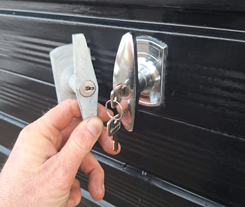 Garage door fitted with a new replacement lock