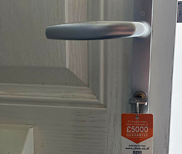 New lock, key and handle on an internal house door