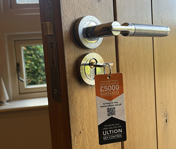 New handles and security lock with guarantee fitted to a wooden door